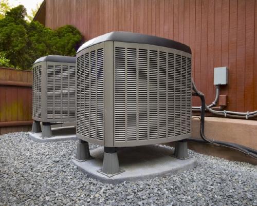 Two air conditioning units outside